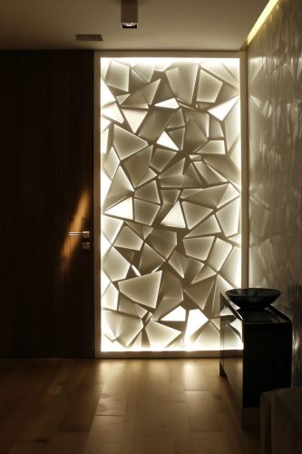 Backlit panel designs for walls