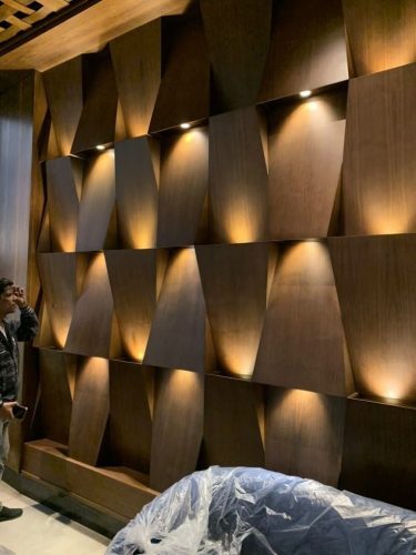 Backlit panel designs for walls